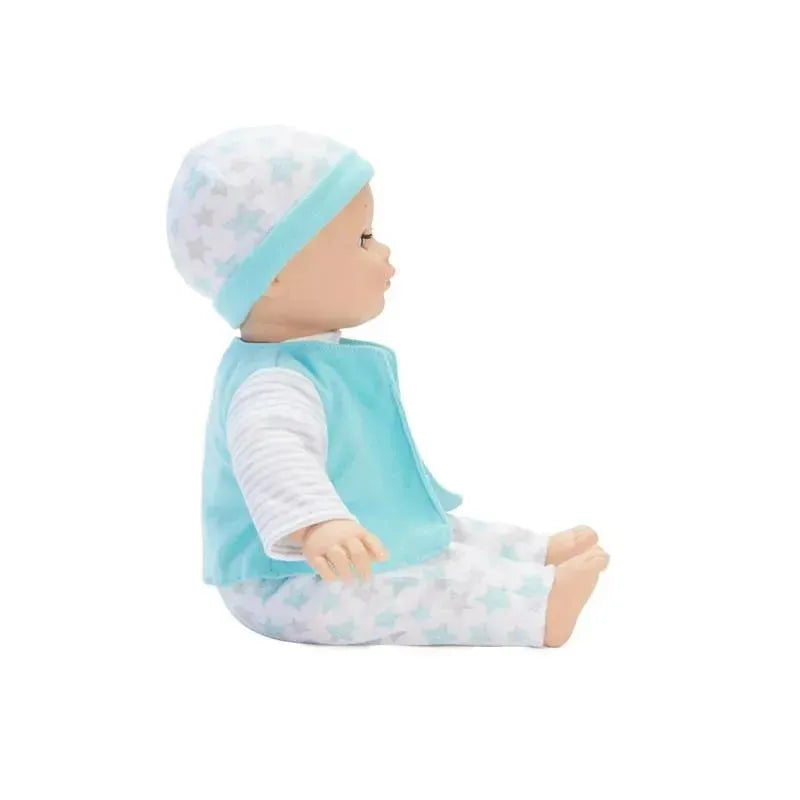 Madame Alexander Babble Baby Starfish doll dressed in a blue star-patterned outfit and matching hat, sitting with a neutral expression.