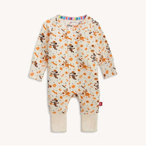 Modal convert coverall featuring a Halloween theme with orange pumpkins and whimsical characters on a cream background.