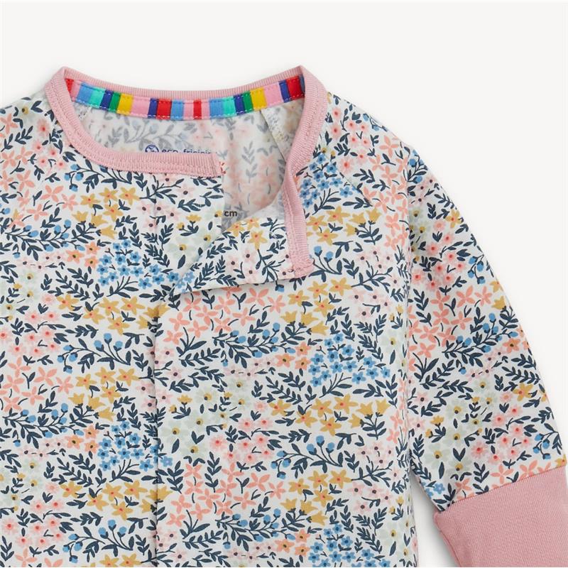Colorful floral patterned convertible coverall with pink trim and a rainbow-striped neckline.
