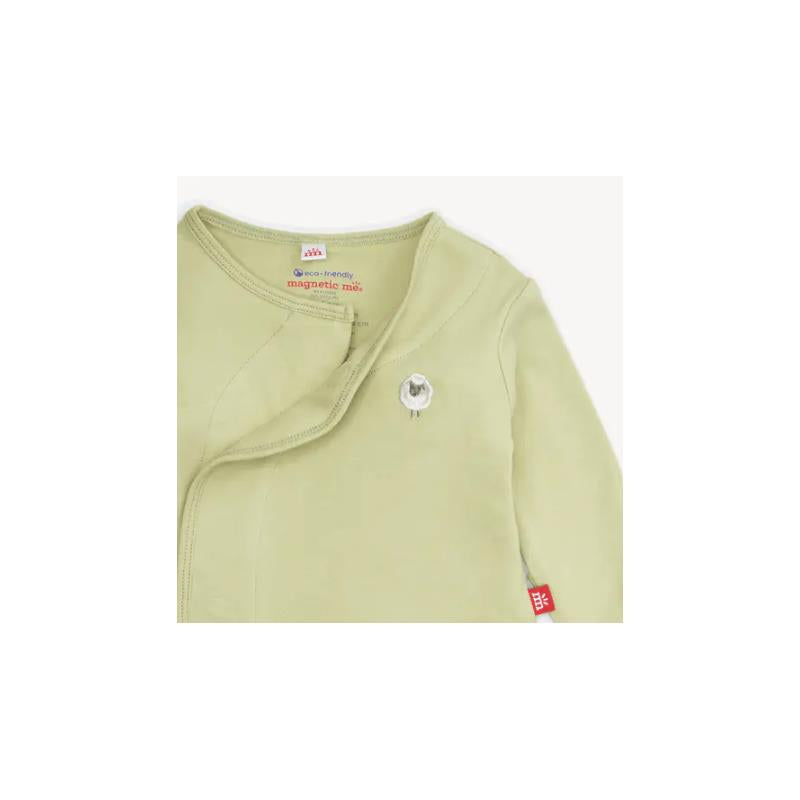 Organic cotton kimono in light green with a sheep design, featuring magnet closures and a red tag.