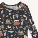 Long sleeve pajamas featuring a Harry Potter design with motifs like Hogwarts, a train, and magical creatures.