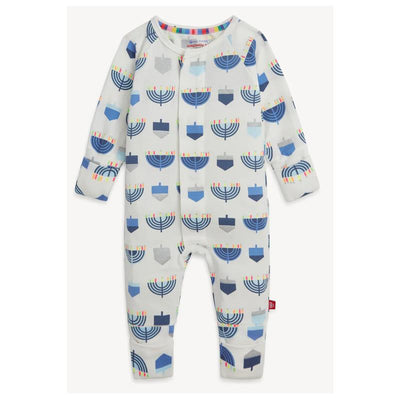 Modal coverall with colorful menorah and dreidel patterns, featuring long sleeves and button closure.