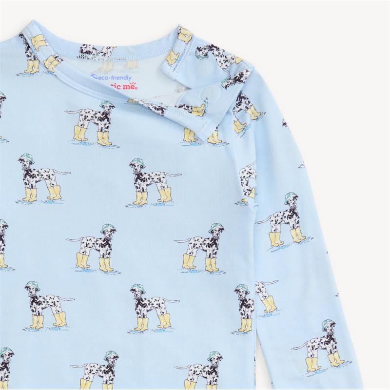 Blue long sleeve pajamas featuring a playful pattern of dogs wearing yellow boots and green hats.