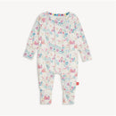 Convertible coverall in modal fabric featuring a whimsical print of castles, flowers, and animals, with snaps down the front.