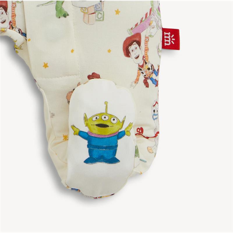 Mod magnetic footie features characters from Toy Story, including Woody and an excited green alien, on a soft, patterned fabric.