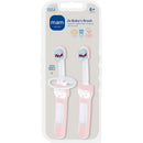 Two pink baby toothbrushes designed for infants aged 6 months and older, featuring a safety shield and easy-to-hold handles.