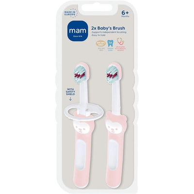 Two pink baby toothbrushes designed for infants aged 6 months and older, featuring a safety shield and easy-to-hold handles.