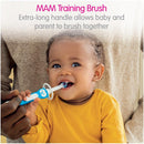 MAM training brush held by a baby, featuring an extra-long handle for parents to assist in brushing together.
