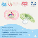 Two Mam Original Night Pacifiers in pink and green, glowing in the dark, with features including easy sterilization, dentist-developed design, and high nipple acceptance.