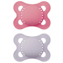 Two baby pacifiers in pink and lavender colors, designed for girls, suitable for infants 0 to 6 months.