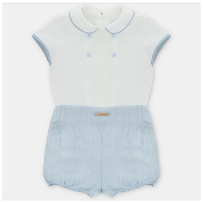 Baby boy set featuring a short-sleeved white shirt with blue trim and matching blue bloomer shorts.
