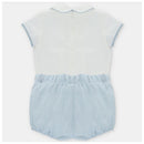 Baby boy set featuring a beige shirt with blue trim and matching bloomer shorts, designed for comfort and style.