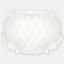 Baby girl bloomer in woven fabric featuring a white base with light blue floral prints and ruffled edges.