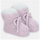 Soft lavender knit booties for baby girls, featuring a fluffy white lining and decorative ties.