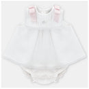 Baby dress set in white with pink bow straps, featuring a pleated bodice and matching bloomer bottom.