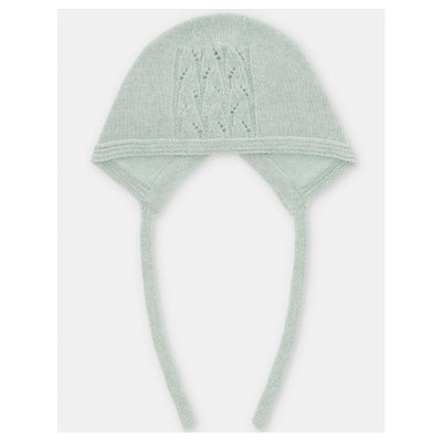 Baby knit bonnet in blue, featuring intricate pattern and ties for secure fitting. Ideal for infants.