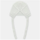 Beige knit bonnet for babies featuring ties, a soft texture, and an elegant design suitable for warmth and style.