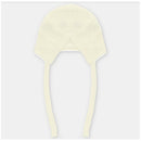 Light pink knit bonnet for babies with ties and textured detailing. Designed to keep infants warm and stylish.