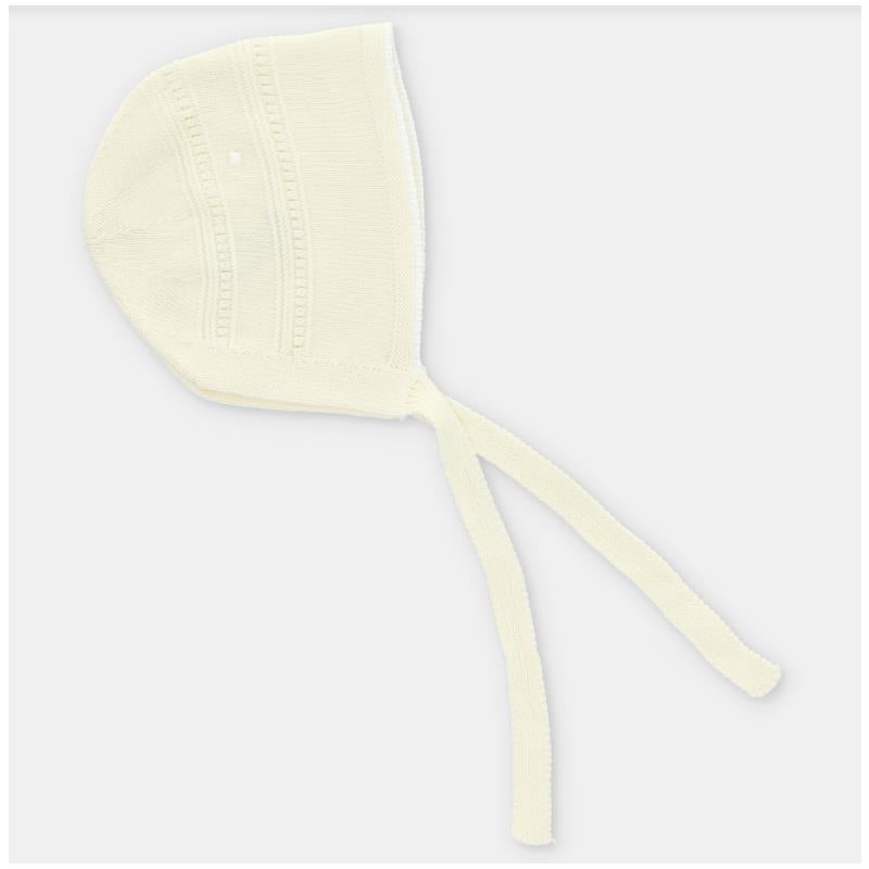 Light pink baby knit bonnet featuring ear flaps and ties for secure fit, ideal for newborn wear.