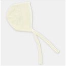 Light pink baby knit bonnet featuring ear flaps and ties for secure fit, ideal for newborn wear.