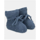 Light blue knitted baby booties with a folded cuff and bow detail, designed for newborns.