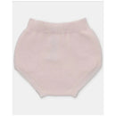 Light pink knitted baby bloomer with a stretchy waistband and ribbed texture, ideal for comfortable wear.