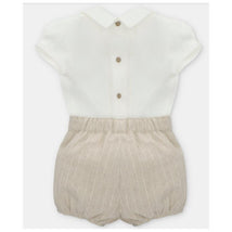 Baby set featuring a white short-sleeved shirt with button details and beige striped bloomers.
