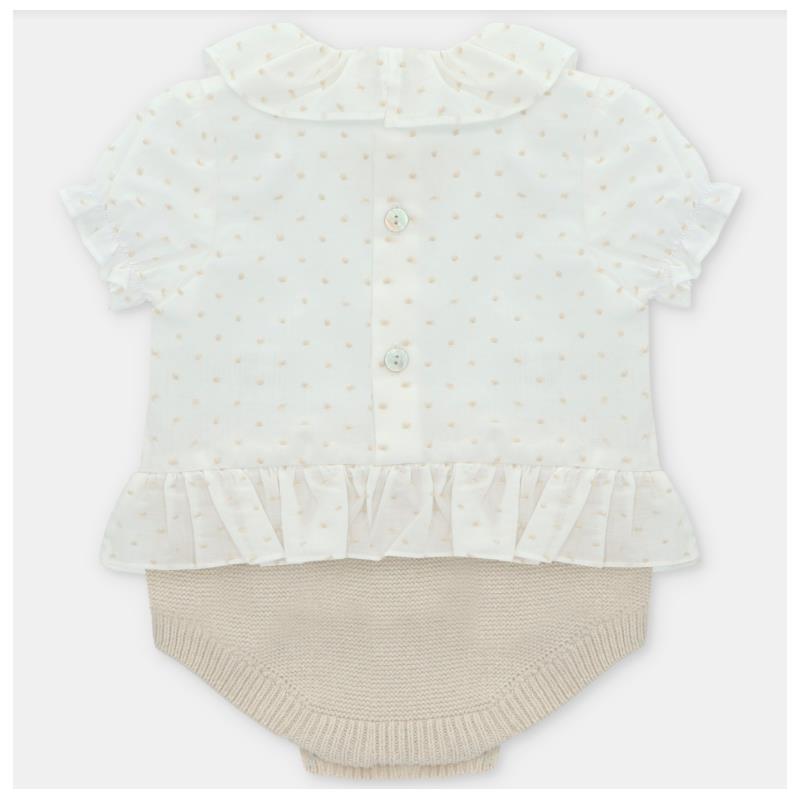 Baby short romper by Martin Aranda featuring a light, polka-dotted top with ruffle sleeves and a knitted beige bottom.