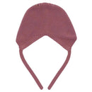 Basic knit bonnet in plum and light pink, featuring a rounded top and ties for secure fit.