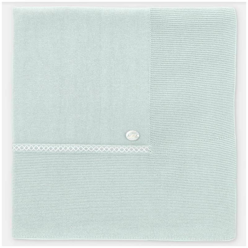 Light pink Martin Aranda Blanket Knit Edmonton, featuring textured knit sections and a decorative button detail.