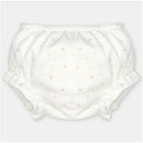 Woven fabric bloomer in Onis Beige with a light star pattern and ruffled edges.