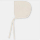 Cotton blend bonnet in sweater knit, featuring a cream color and tie straps for securing under the chin.