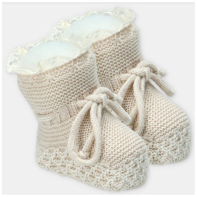 Martin Aranda booties in a sweater knit cotton blend, featuring a lace trim and bow detail, in a neutral color.