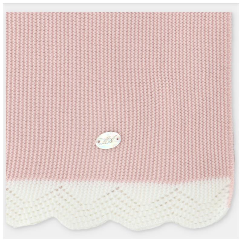 Draylon sweaterknit blanket in baby pink with a scalloped white edge and a silver logo tag.