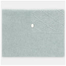 Dusty rose Draylon sweaterknit blanket with a textured diamond pattern and a decorative button detail.