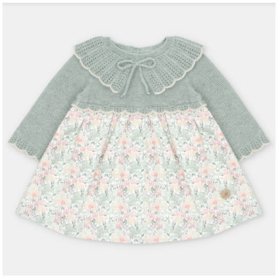 Martin Aranda dress featuring a knitted top in soft green with a lace collar, and a floral fabric skirt in pink and cream tones.
