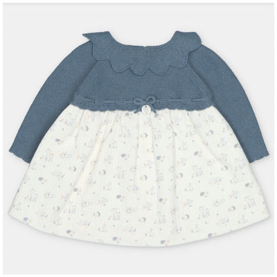 Martin Aranda dress featuring a blue sweater knit bodice with a scalloped collar and a patterned white fabric skirt.