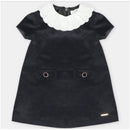 Martin Aranda black woven dress featuring a white scalloped collar and two front pockets with gold rings.