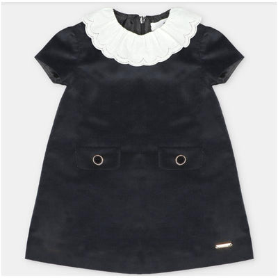 Martin Aranda black woven dress featuring a white scalloped collar and two front pockets with gold rings.