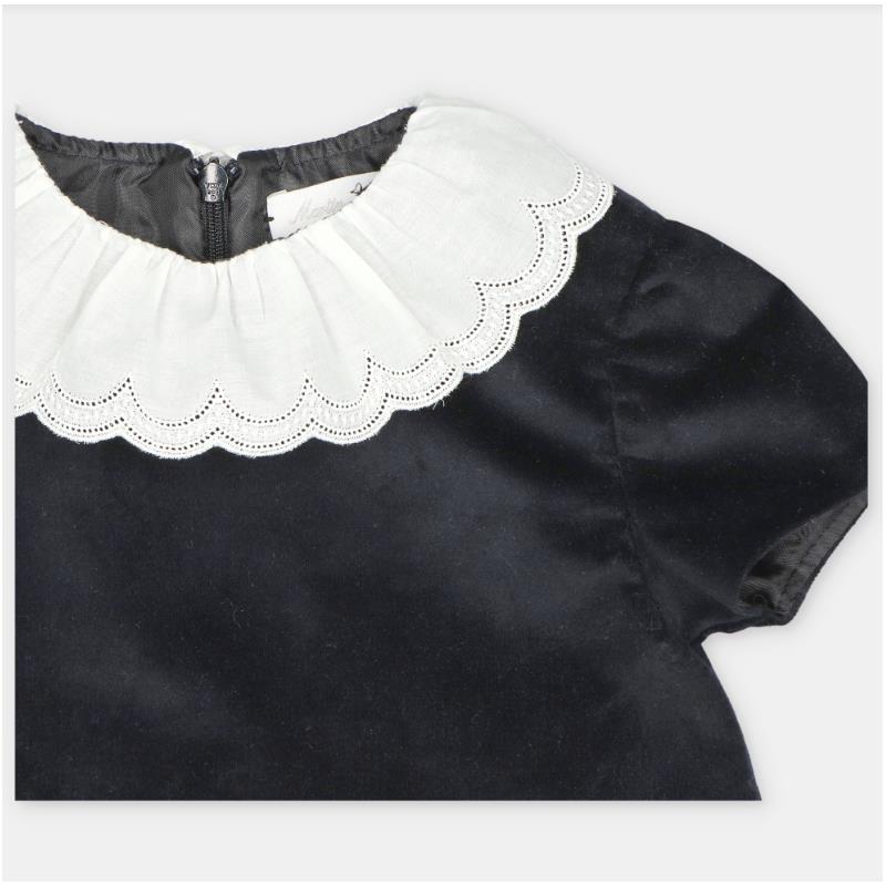 Martin Aranda Dress in Pesoz Black, featuring a scalloped white collar and zip closure at the back.