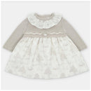 Knit and woven mix dress in Newport and stone colors, featuring a frilly collar and floral print skirt.