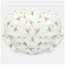 White bloomers with floral print, featuring pink flowers and ruffle trim on the leg openings.