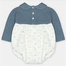 Short romper featuring a blue sweater knit top and a lightweight white bottom with animal prints and floral designs.