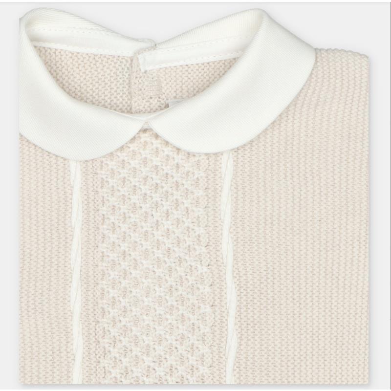 Cream-colored sweater knit cotton set featuring a collared top with textured knit and smooth trim.