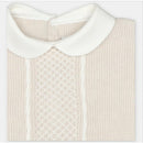 Cream-colored sweater knit cotton set featuring a collared top with textured knit and smooth trim.