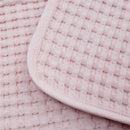 Lulujo Waffle Blanket by Mary Meyer in ballet slipper pink, featuring a textured woven design and soft edges.