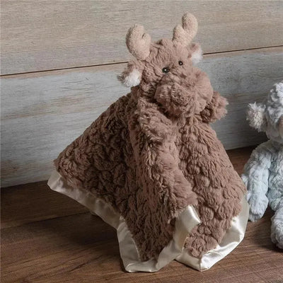 Soft, brown moose character blanket with fluffy texture and satin trim, designed for comfort and cuddling.