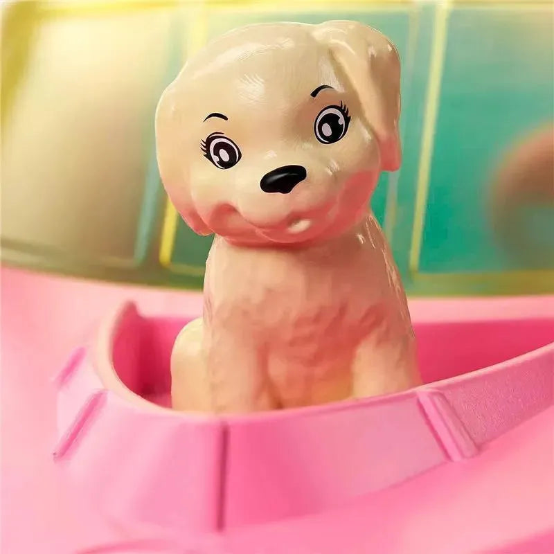 Barbie boat accessory featuring a beige puppy with cartoonish eyes sitting in a pink boat compartment.