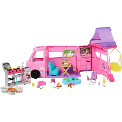 Barbie Dream Camper playset, a pink camper featuring a roof tent, kitchen, seating area, and various outdoor accessories.