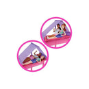 Barbie dolls relaxing in a roof tent on a colorful pink camper playset, featuring vibrant accessories.